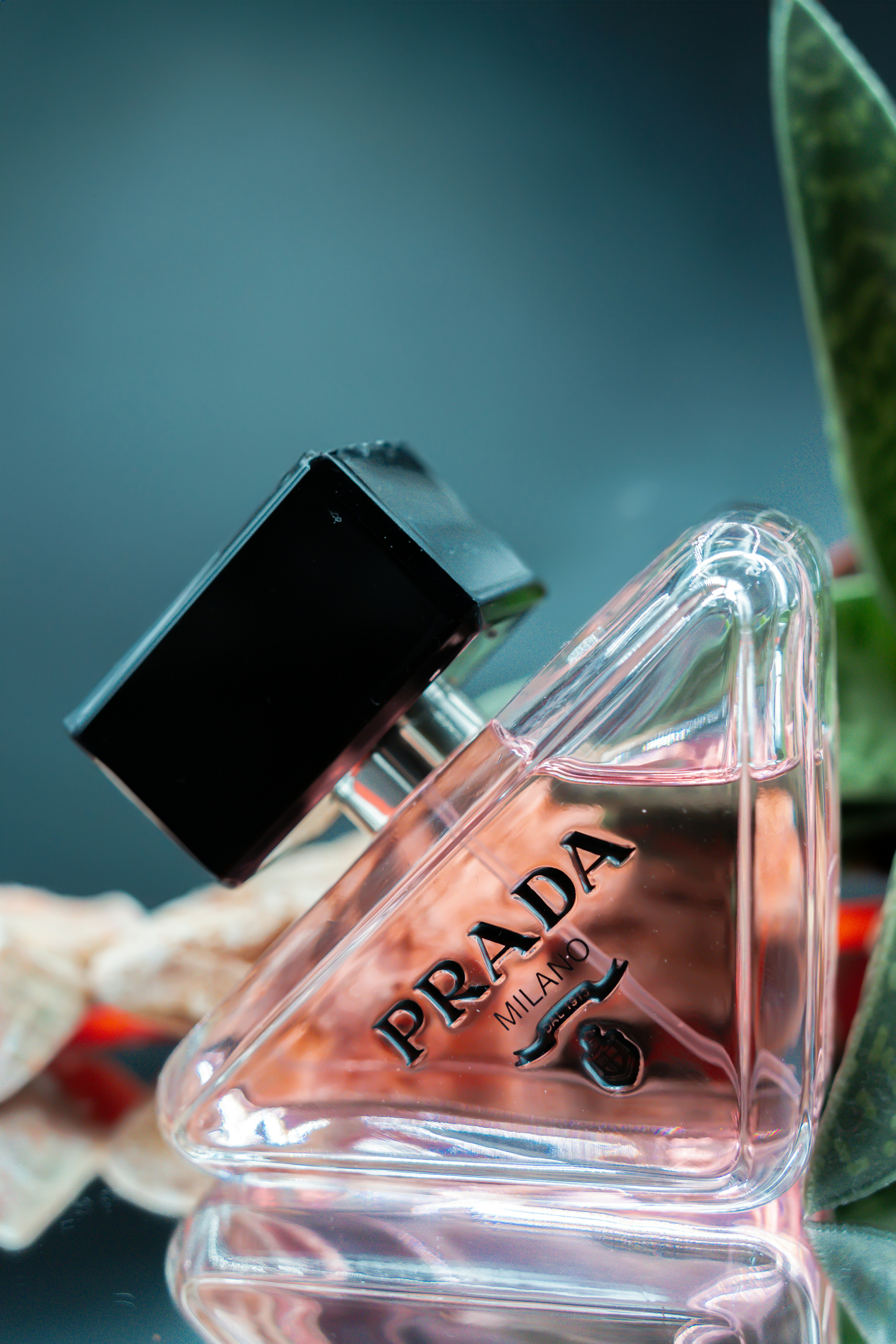 a bottle of perfume sitting on top of a table