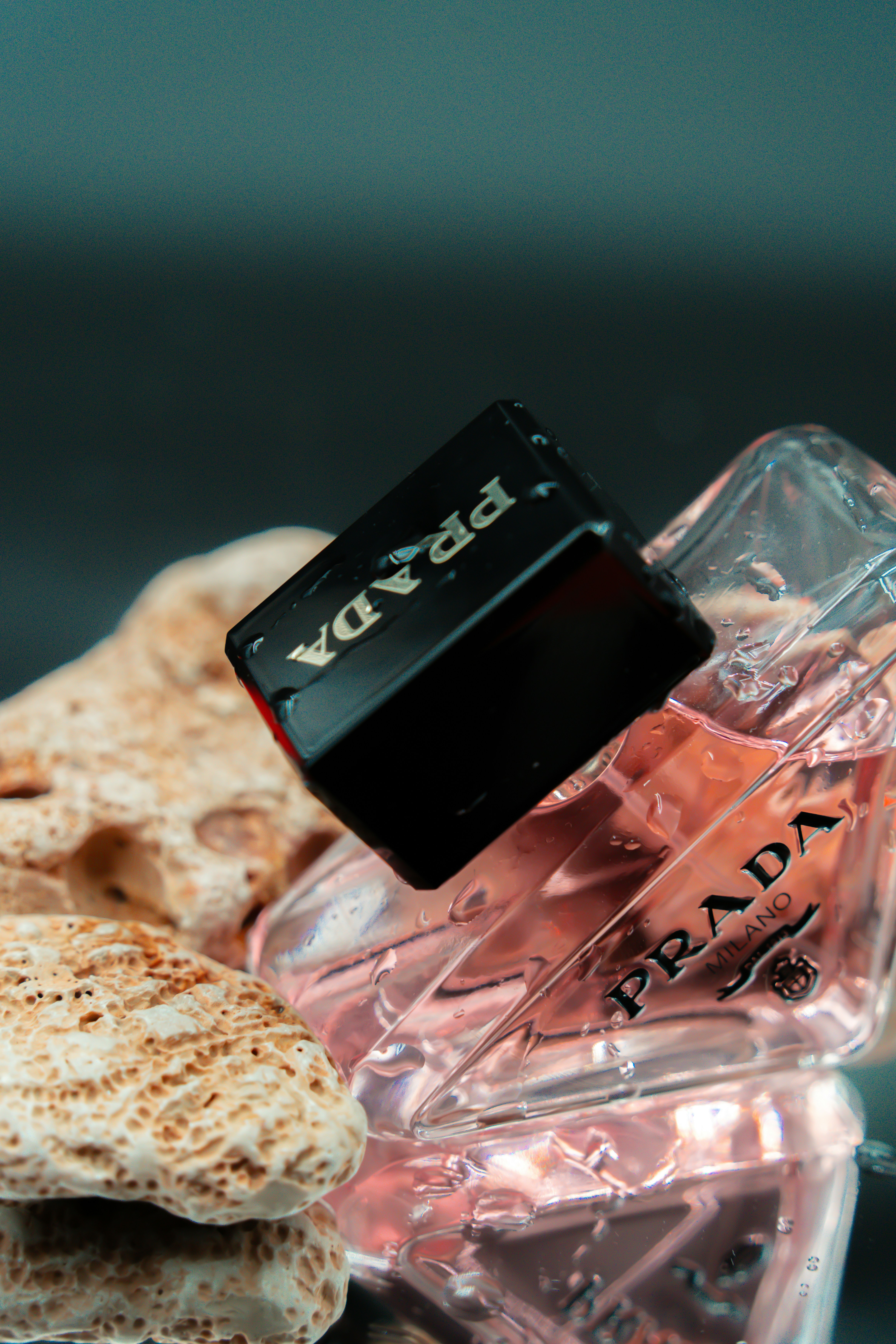 a close up of a bottle of perfume on a table