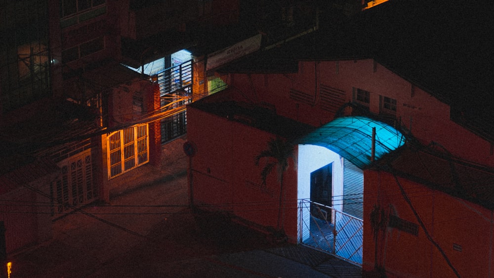 a view of a building at night from above