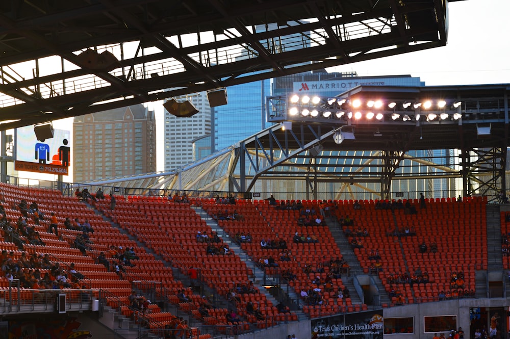 a stadium filled with lots of red seats