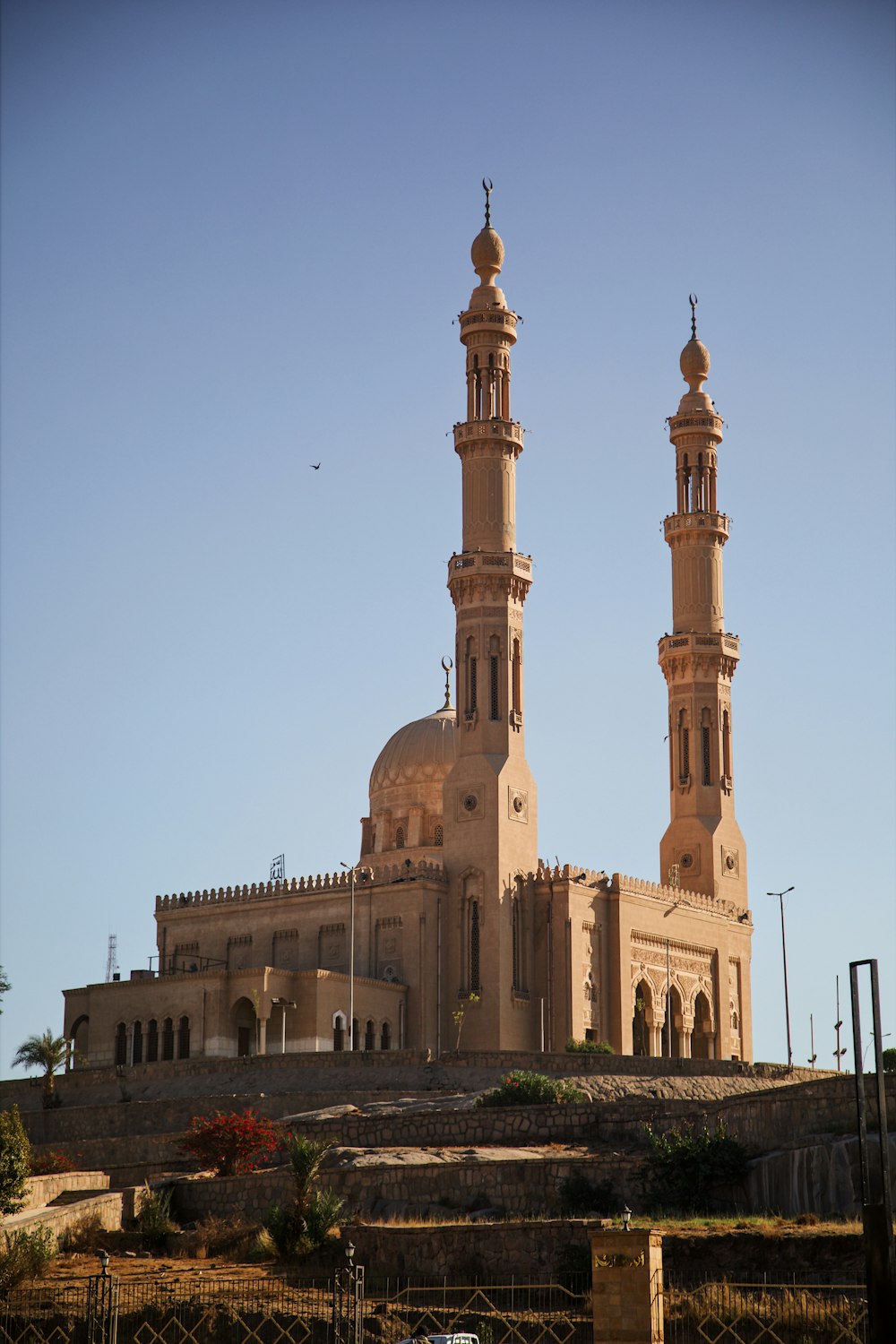 a large building with two towers on top of it
