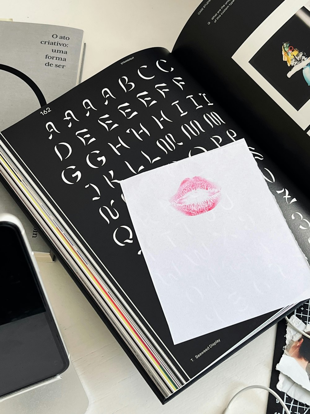 a book opened to a page with a picture of a woman's lips