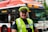 a police officer standing in front of a bus