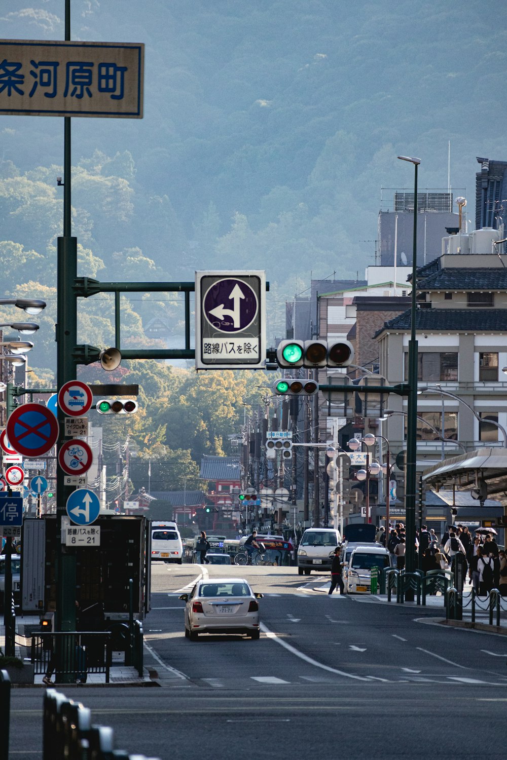 a busy city street with a lot of traffic