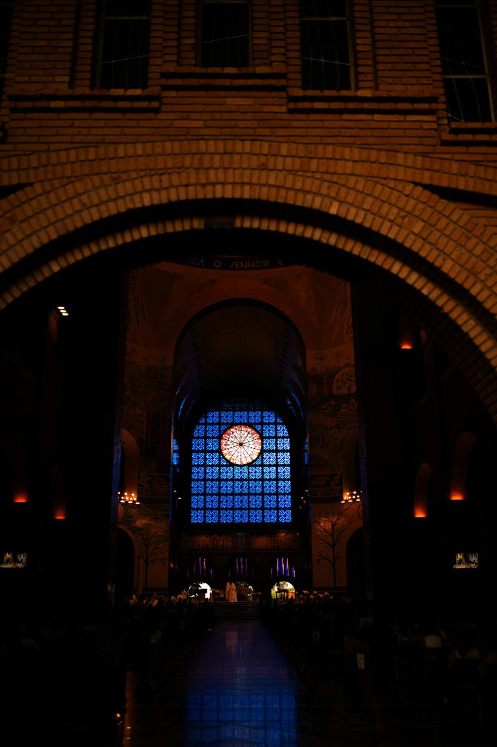 a large clock mounted to the side of a building