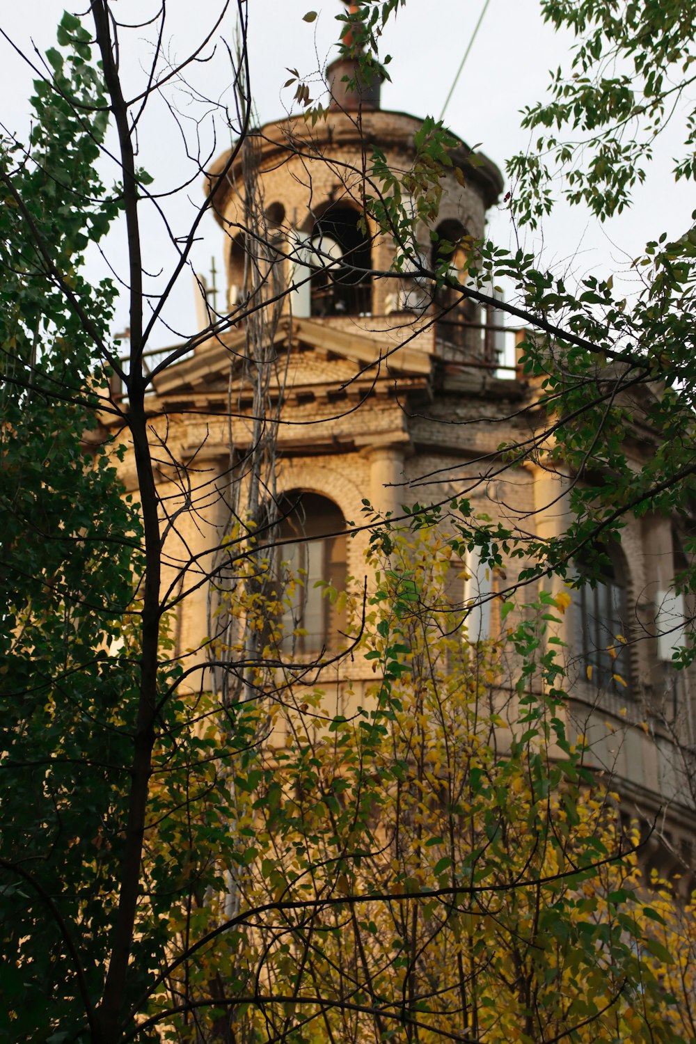 a tall tower with a clock on the top of it