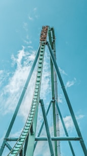 a roller coaster going up in the air