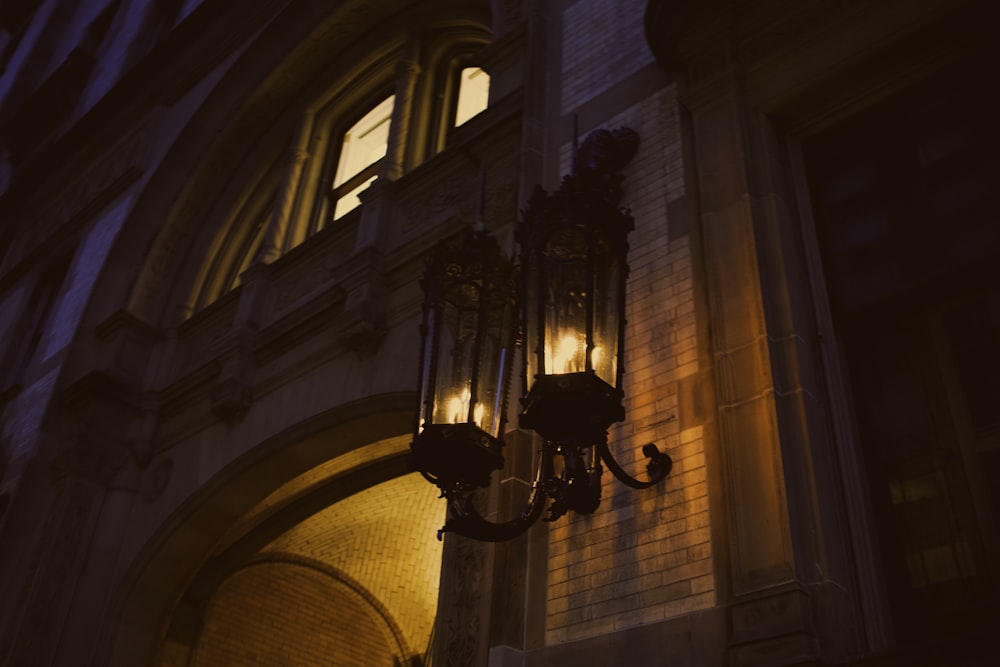 a light hanging from the side of a building