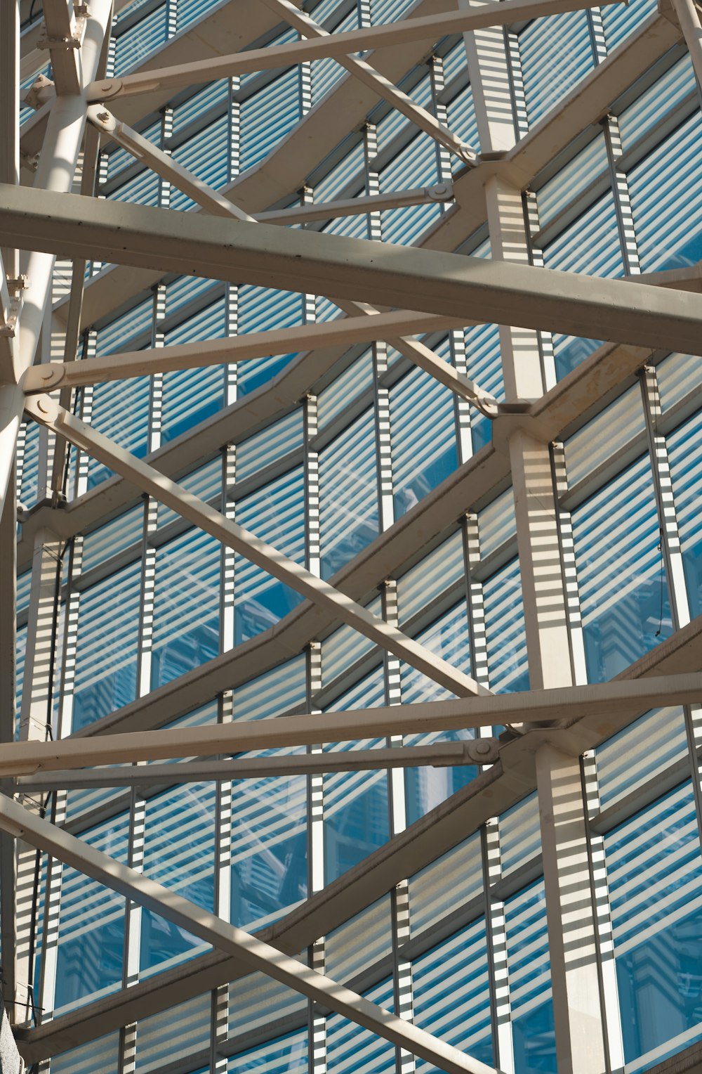 a close up of a metal structure with many windows