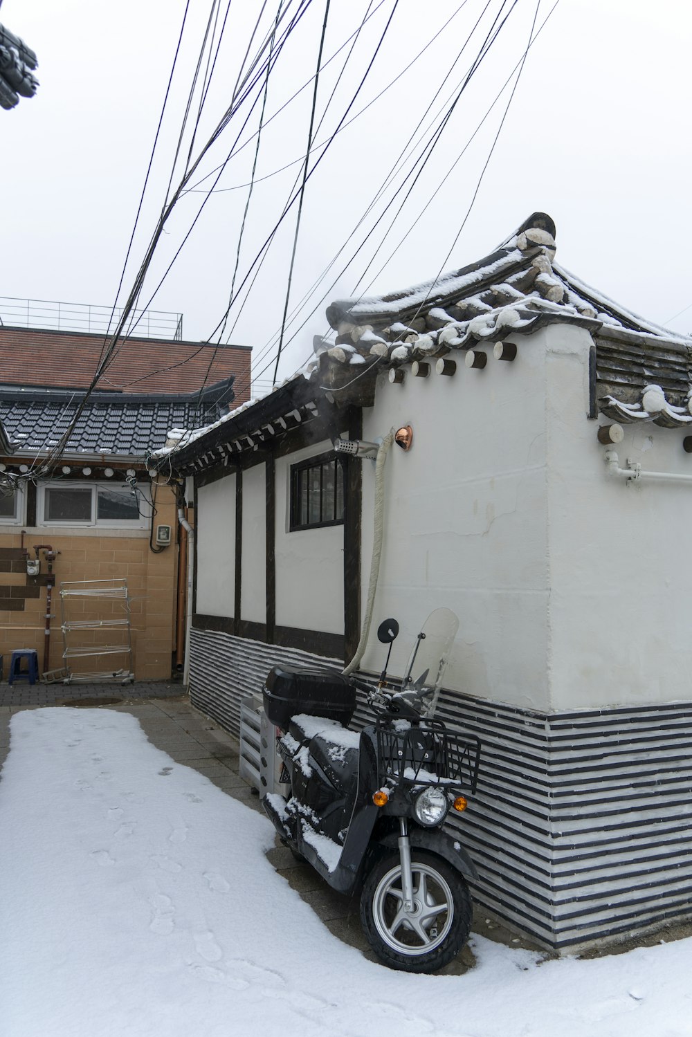 a motorcycle parked in front of a house