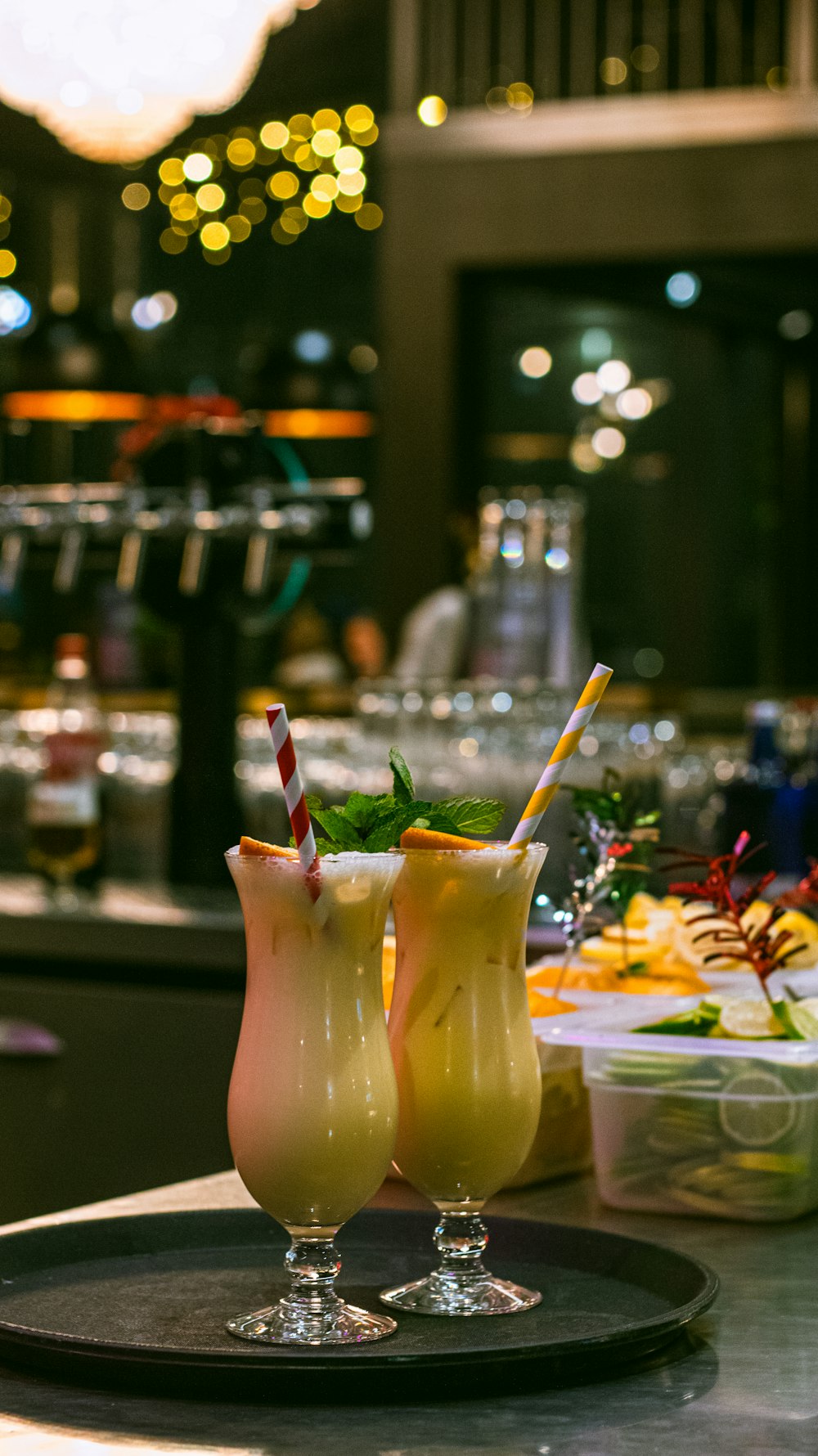 a couple of drinks sitting on top of a table