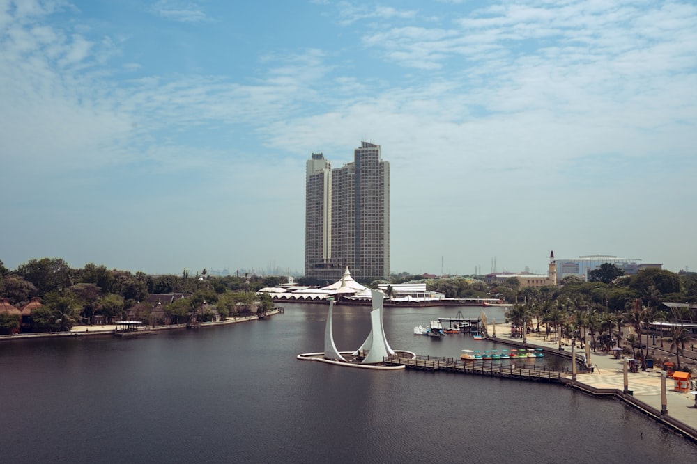 a body of water surrounded by tall buildings