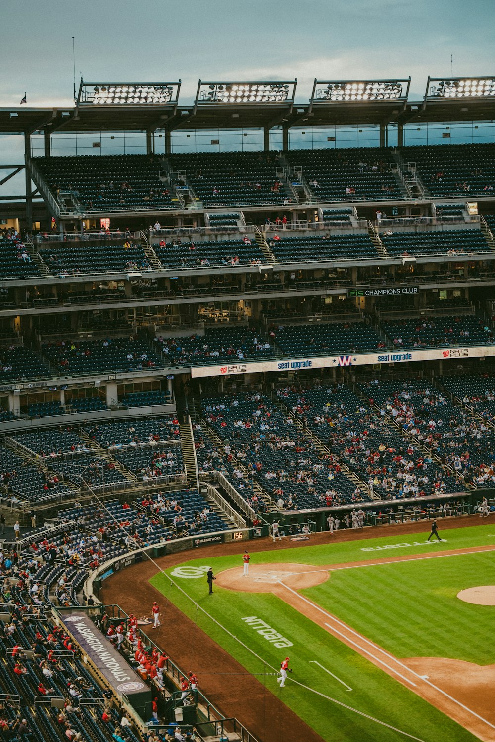 a baseball stadium filled with lots of people