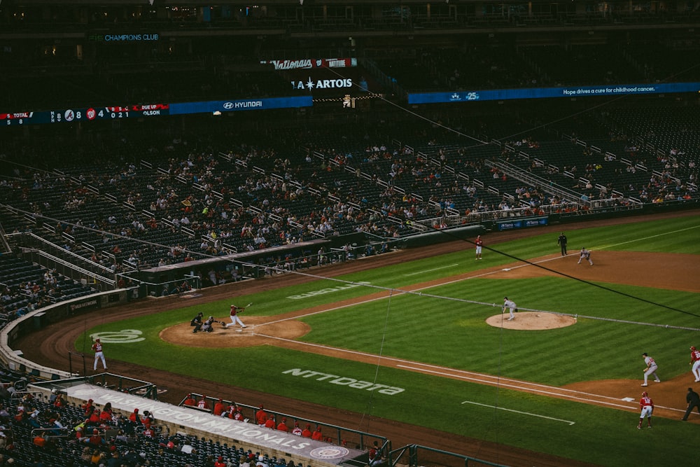 a baseball game is being played in a stadium