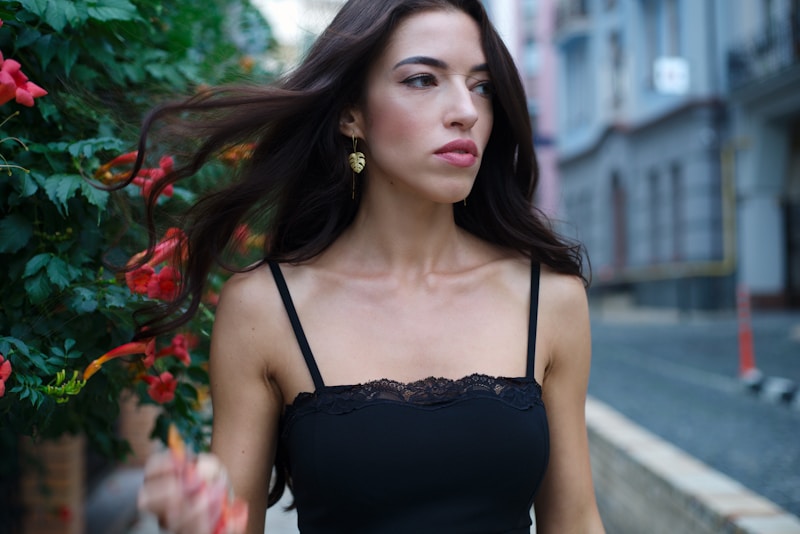 Elegant Greek woman in black dress in Athens