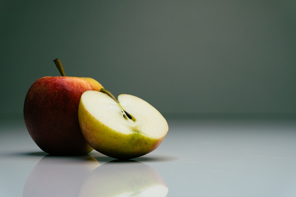 a half eaten apple sitting on top of a table