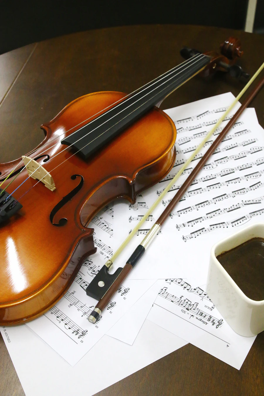 Viola and sheet music with a cup of coffee &mdash; private viola lessons in Suwanee and Cumming begin with a 30-minute evaluation