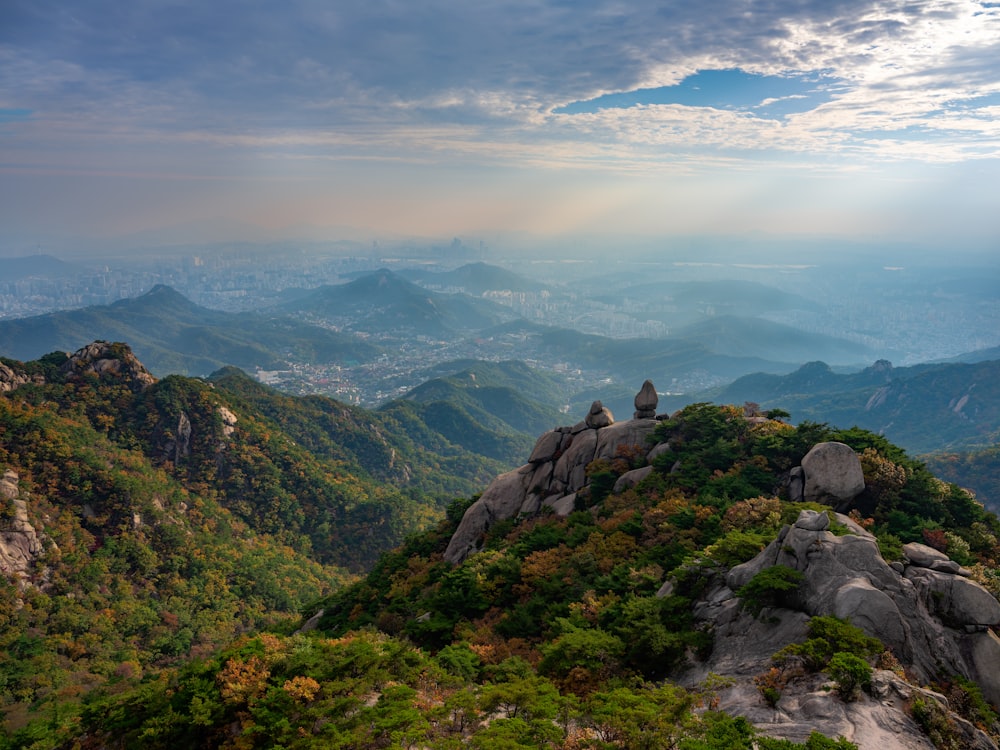 a view of the mountains and valleys from the top of a mountain