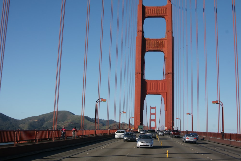 cars driving over the golden gate bridge in san francisco