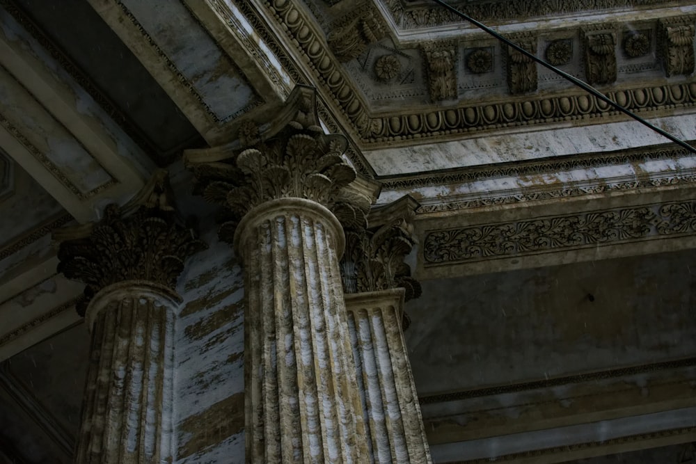 an old building with columns and a clock