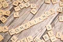 scrabble tiles spelling out the word complaints