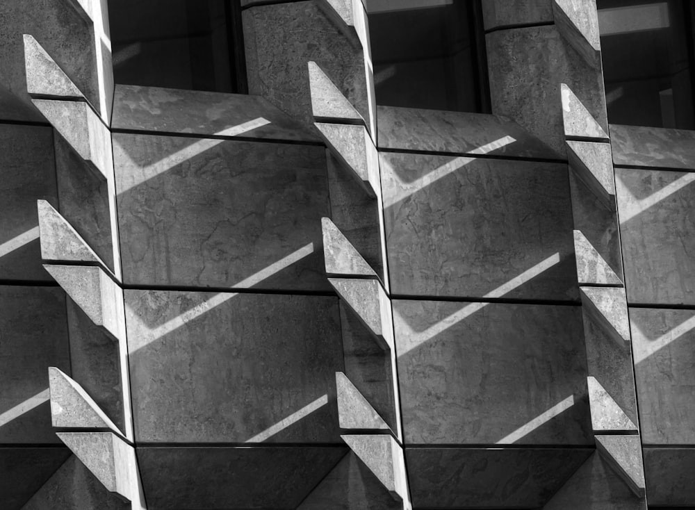 a black and white photo of a building made of concrete blocks