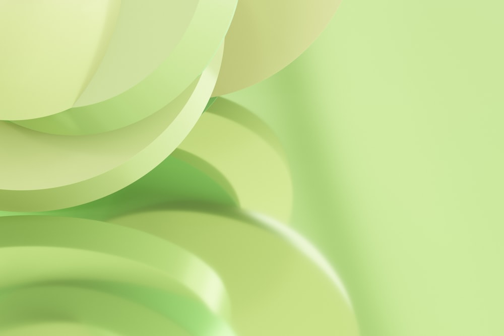 a close up of a green background with circles