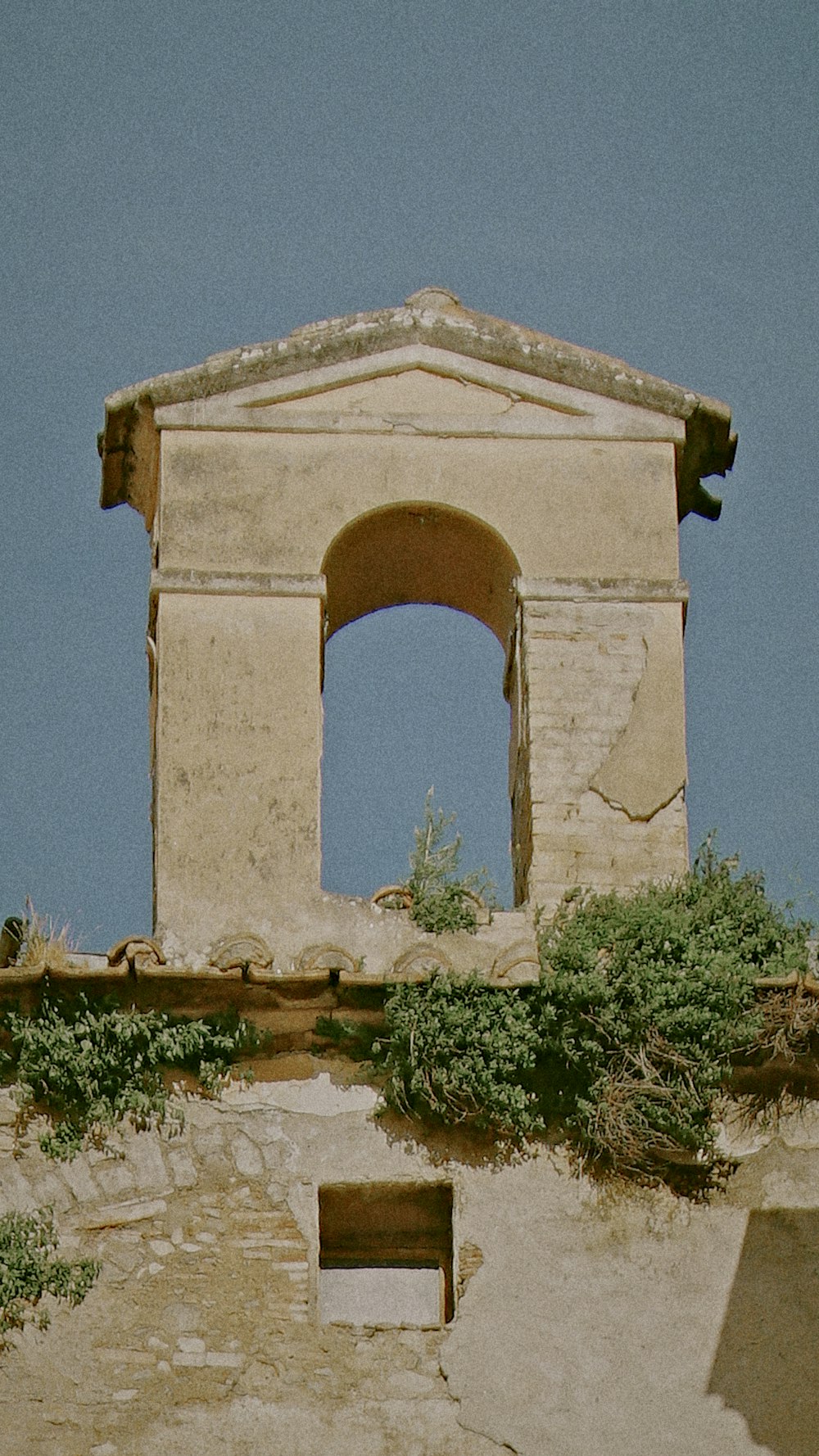 an old building with a clock tower on top of it