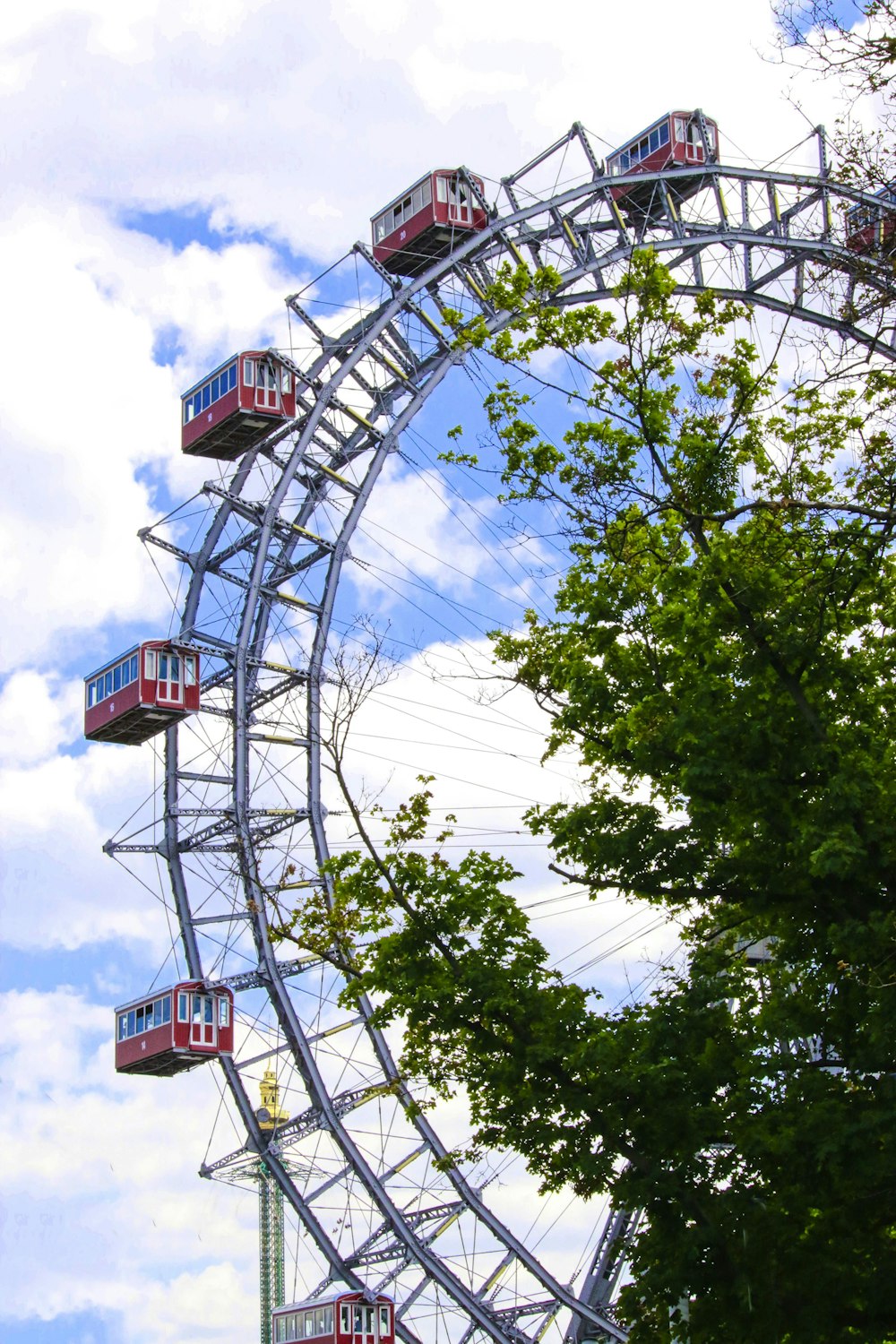 a ferris wheel with a sky background