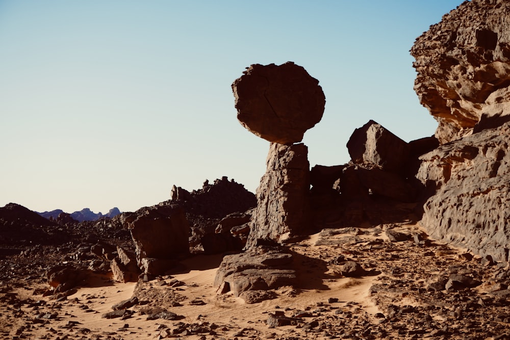 a rock formation in the middle of a desert