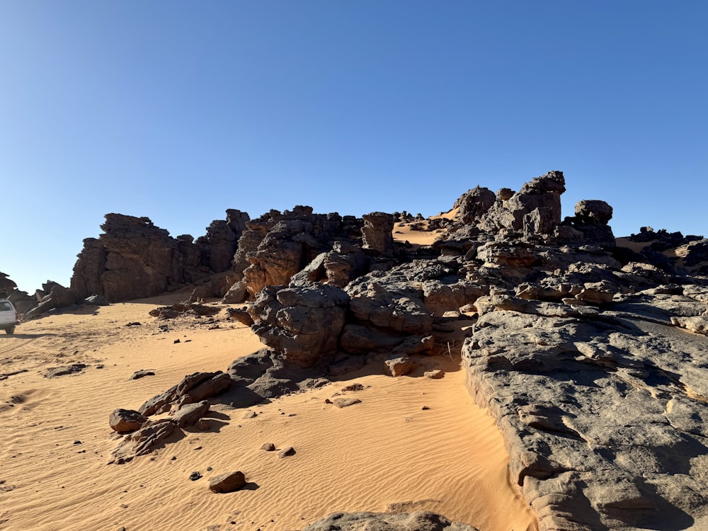 a desert landscape with rocks and sand