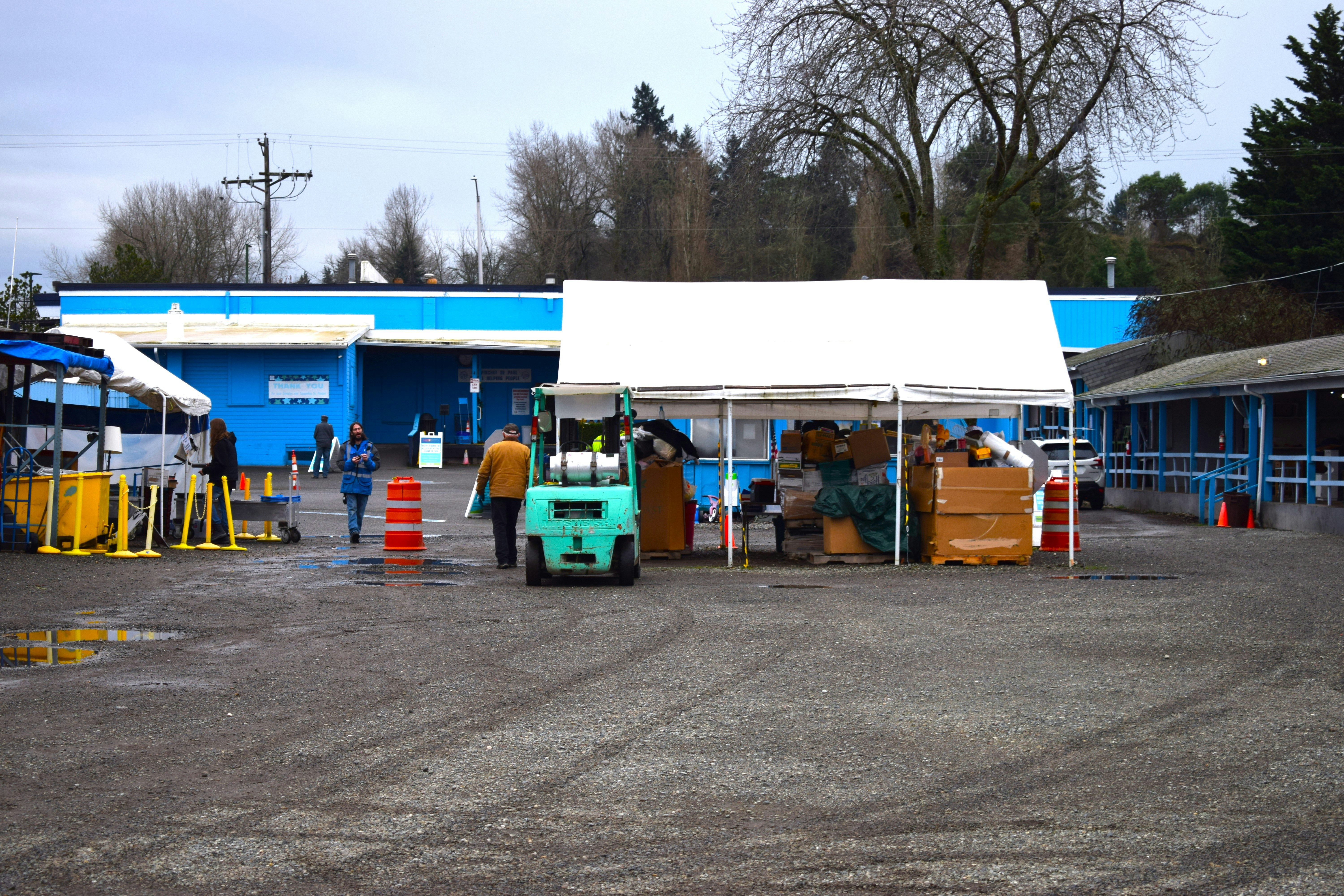 Row of used electric SUVs parked at a dealership lot