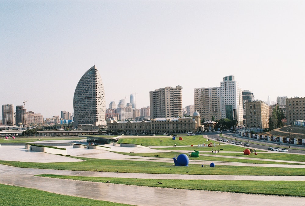 a city with a lot of tall buildings in the background