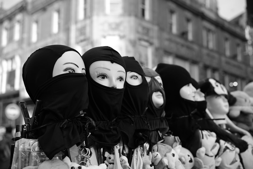 a group of people wearing burkas on their heads