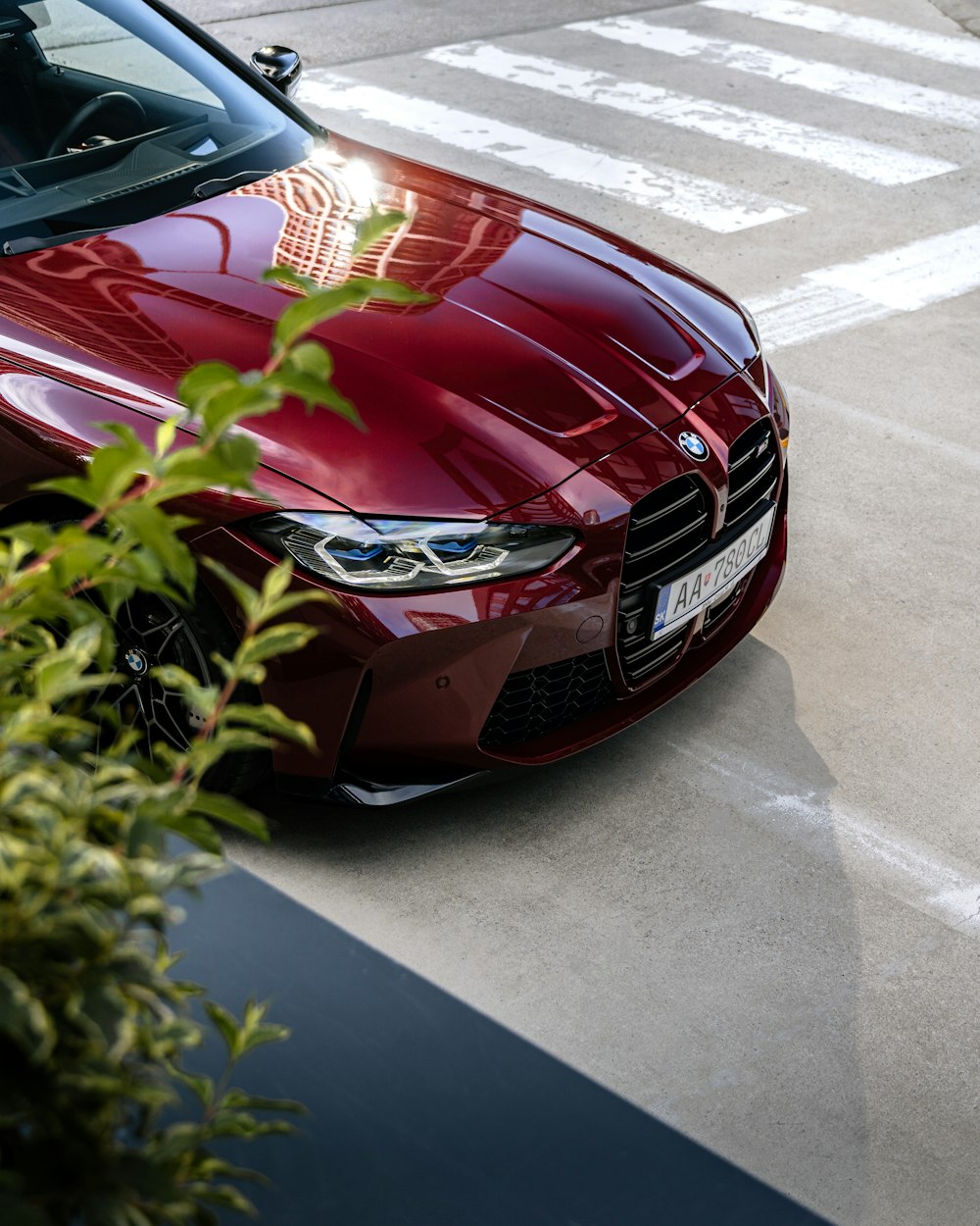 a red car parked on the side of the road