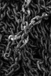 a bunch of chains that are stacked together