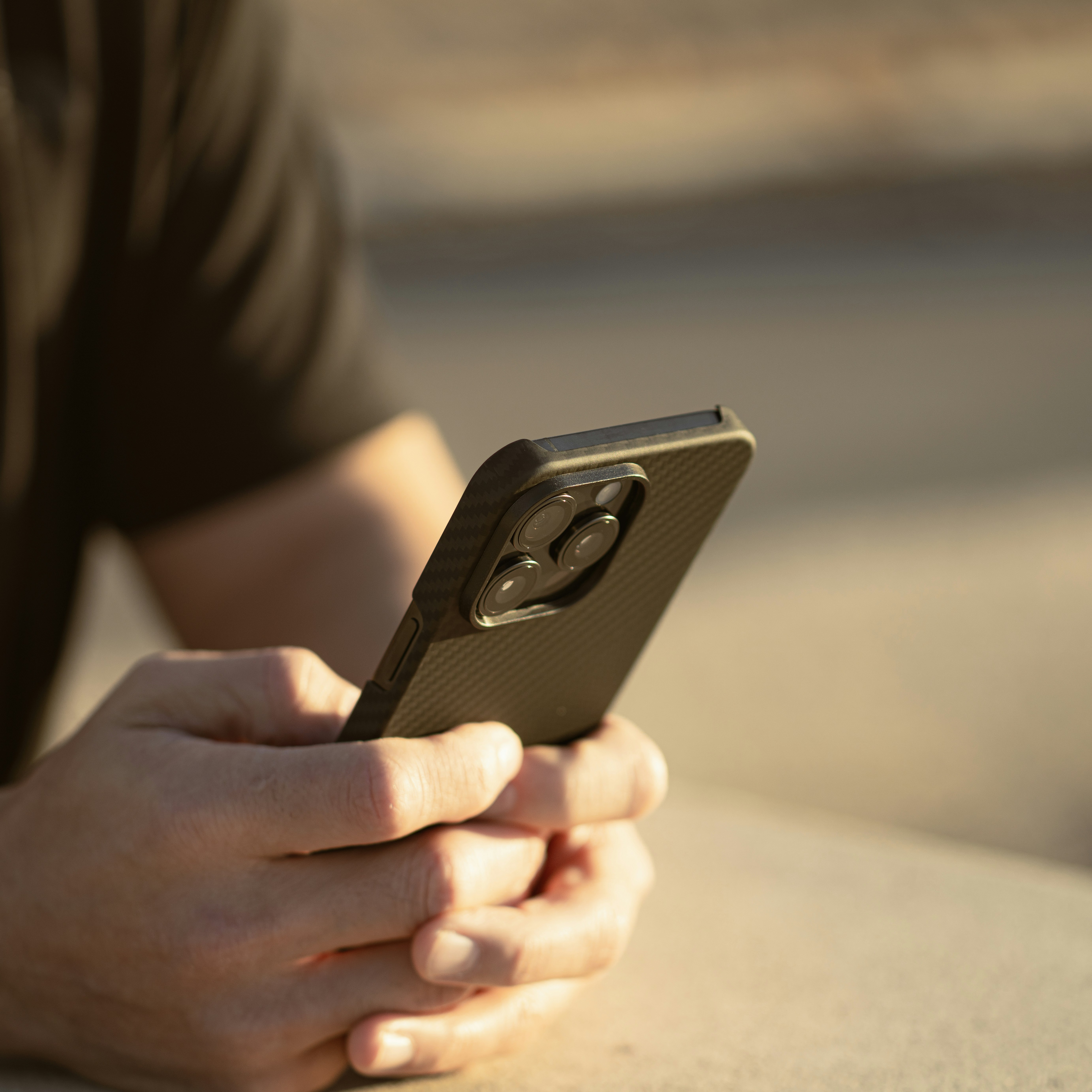 a close up of a person holding a cell phone