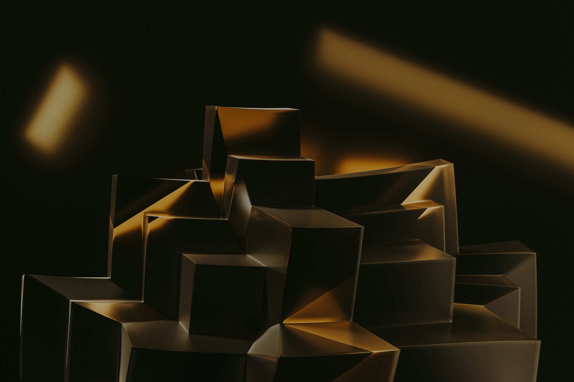 a black and gold abstract painting of cubes