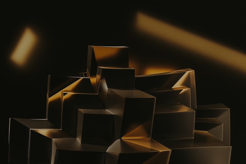 a black and gold abstract painting of cubes