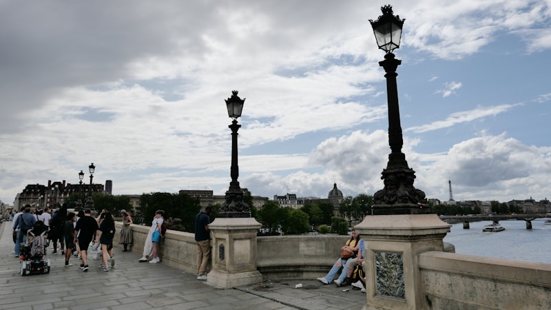 Friends strolling bridge view