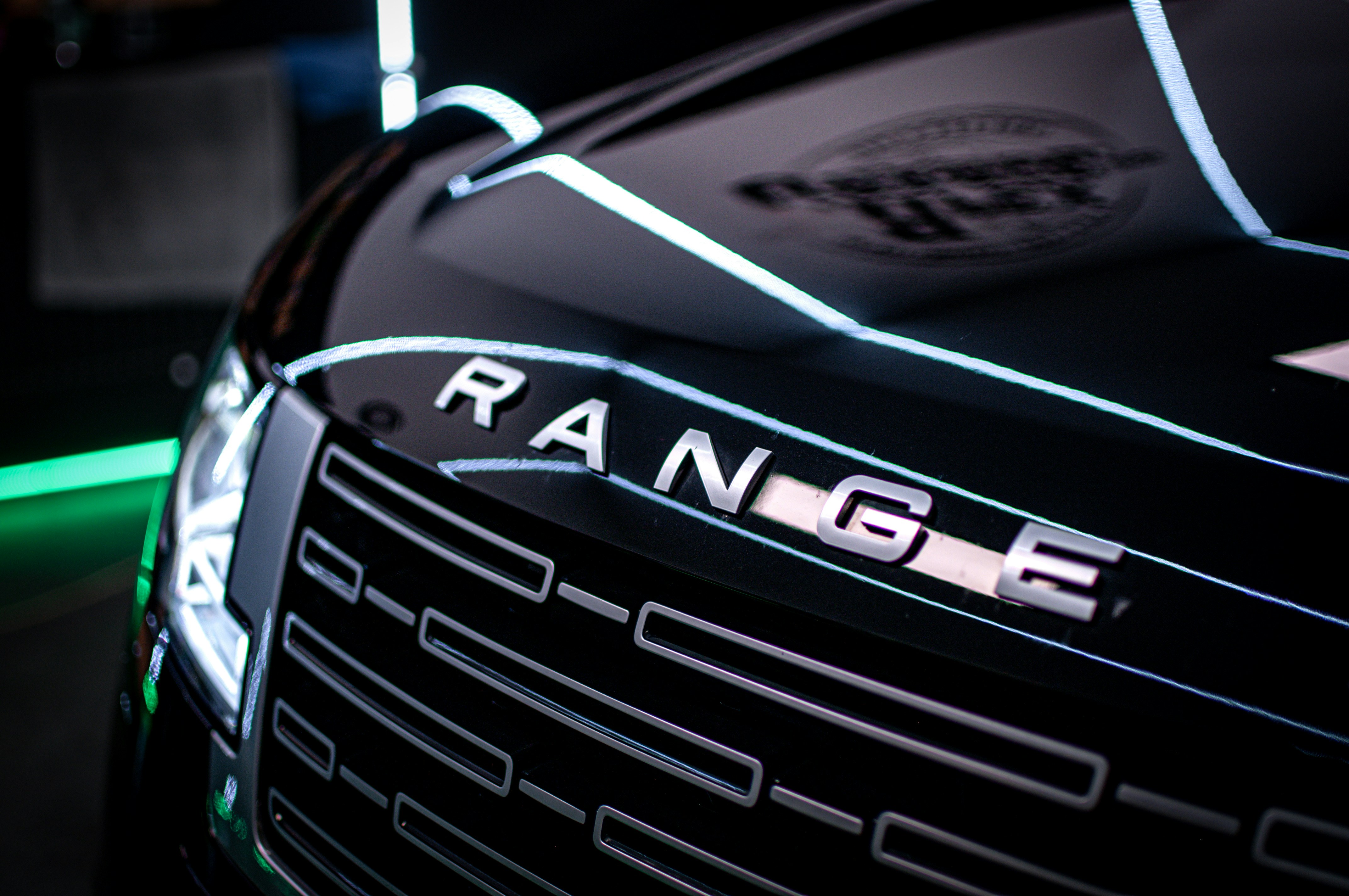 a close up of the front grille of a car