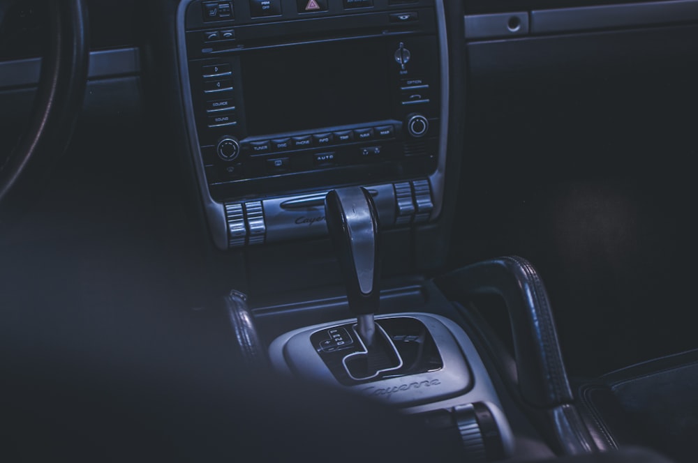 a picture of a car's dashboard with a steering wheel