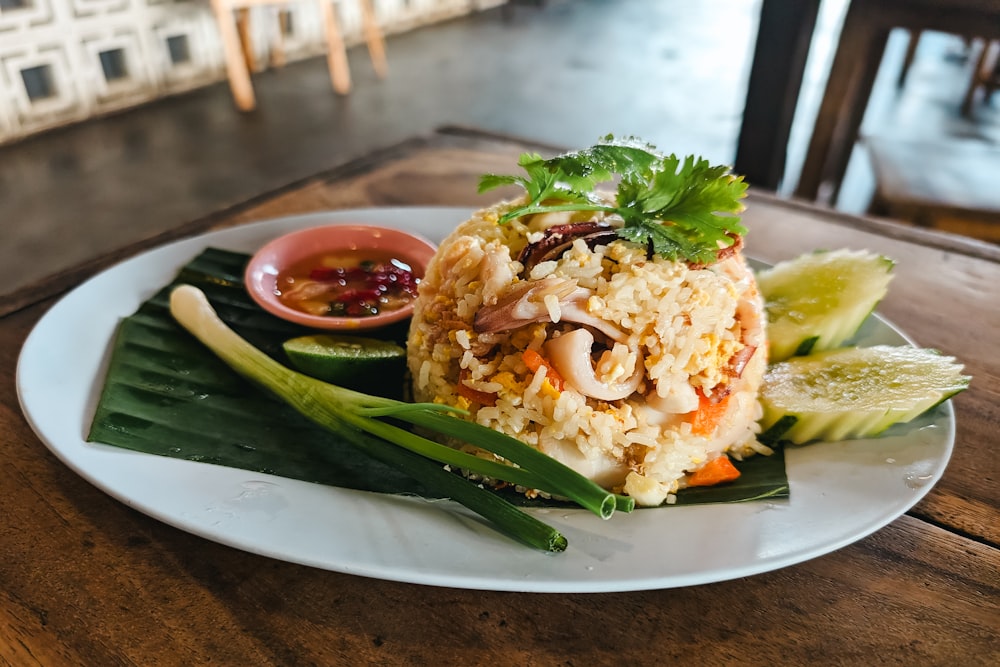 a plate of food on a wooden table