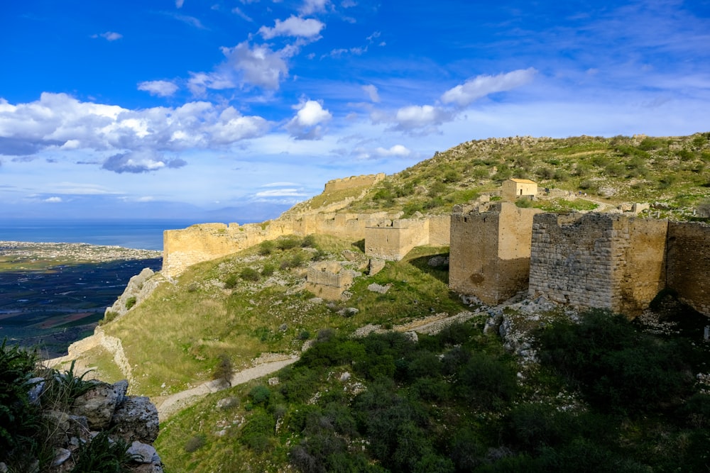 a view of a castle on top of a hill