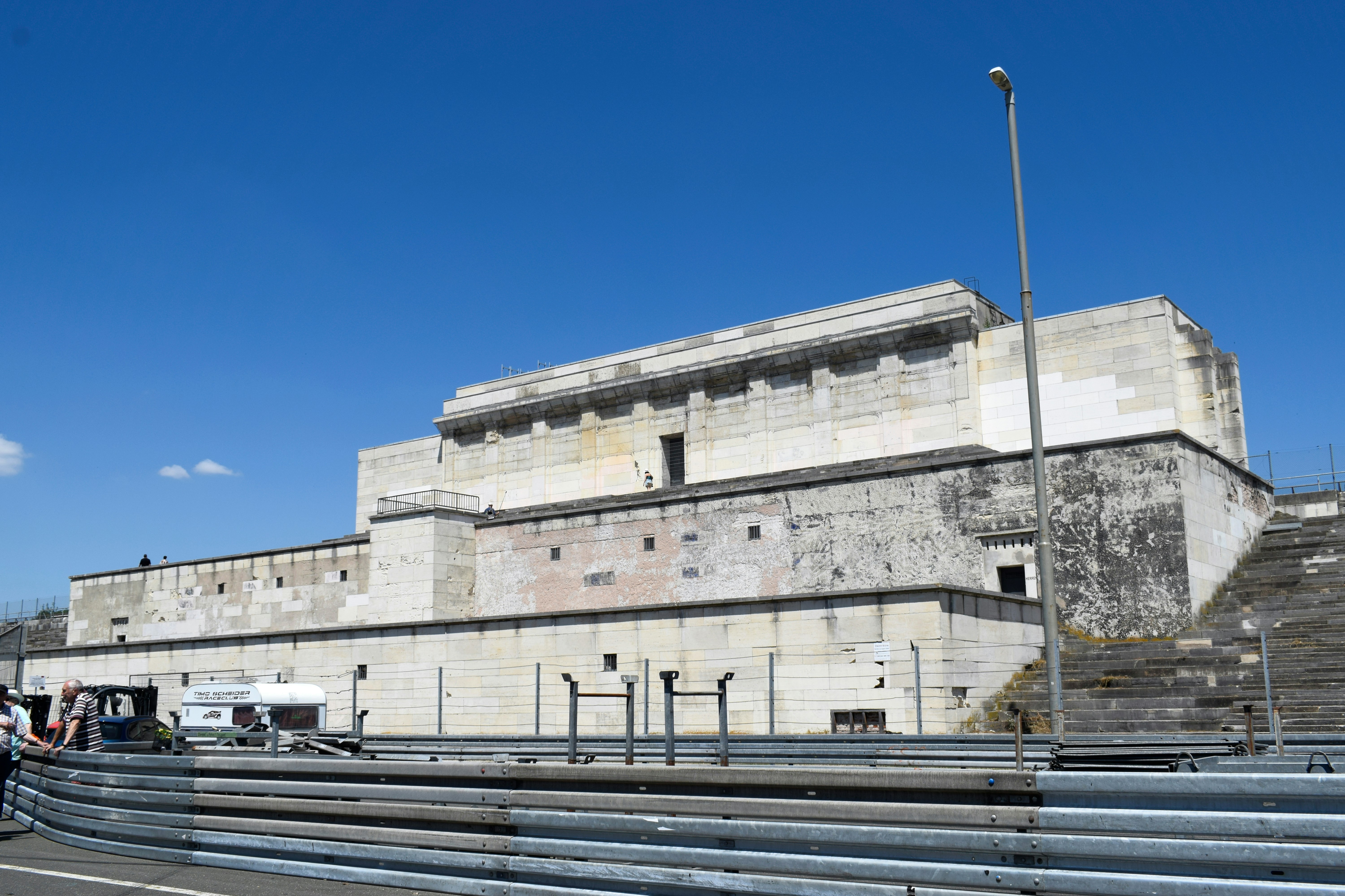 a group of people standing in front of a building