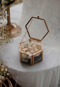 a small box with some flowers inside of it