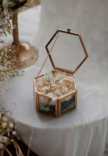a small box with some flowers inside of it