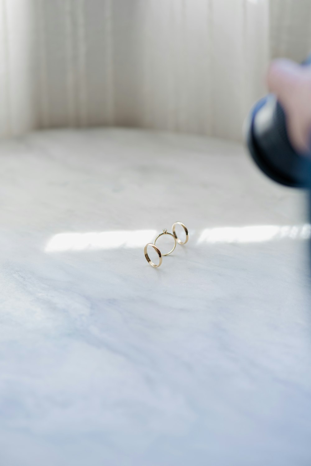 a pair of rings sitting on top of a table