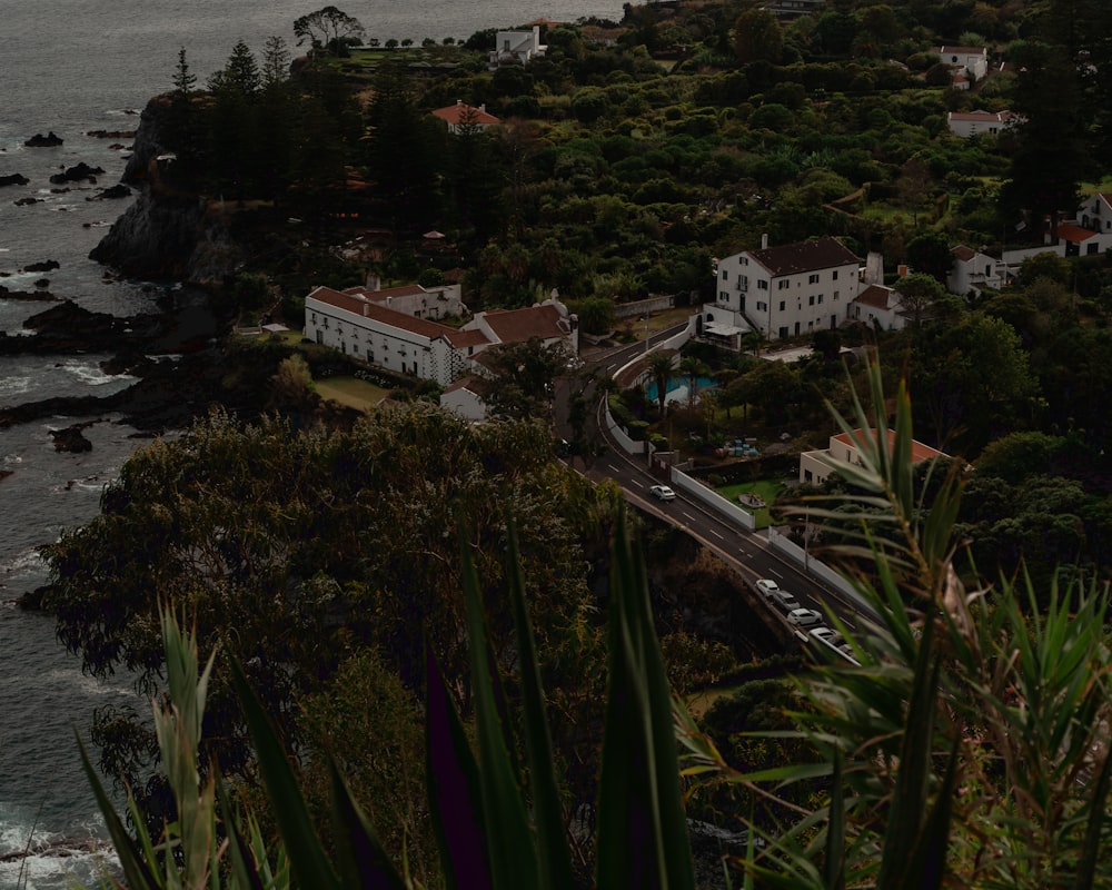 an aerial view of a town by the ocean