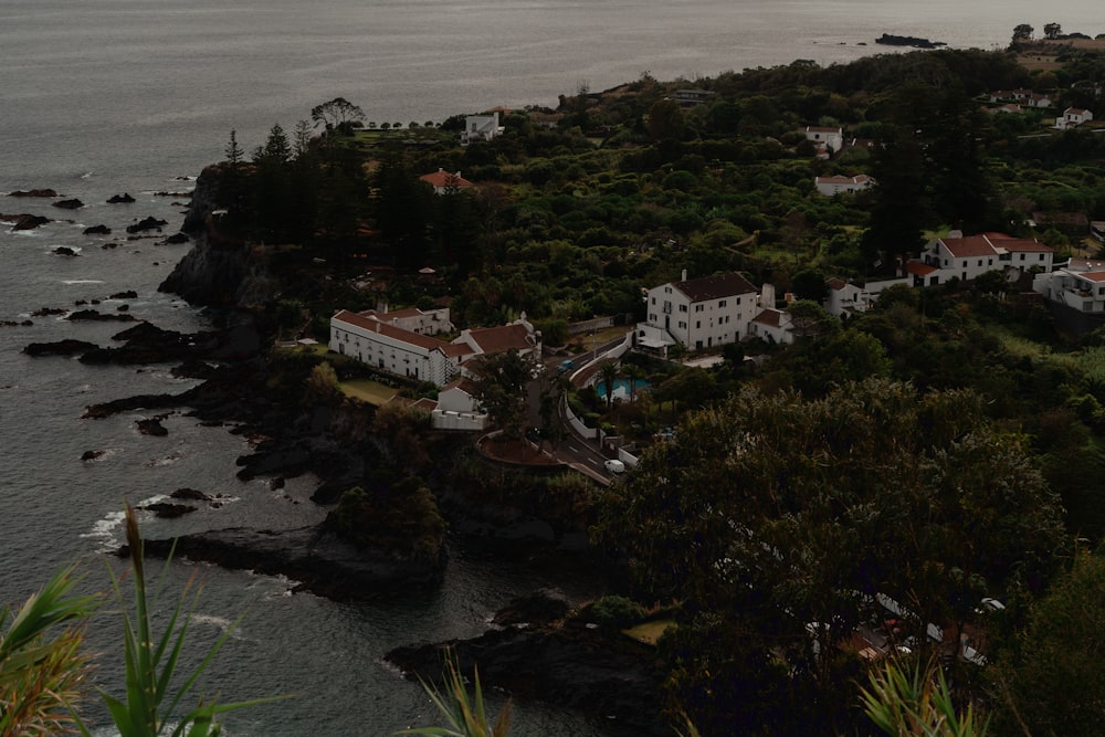 an aerial view of a small town on the coast